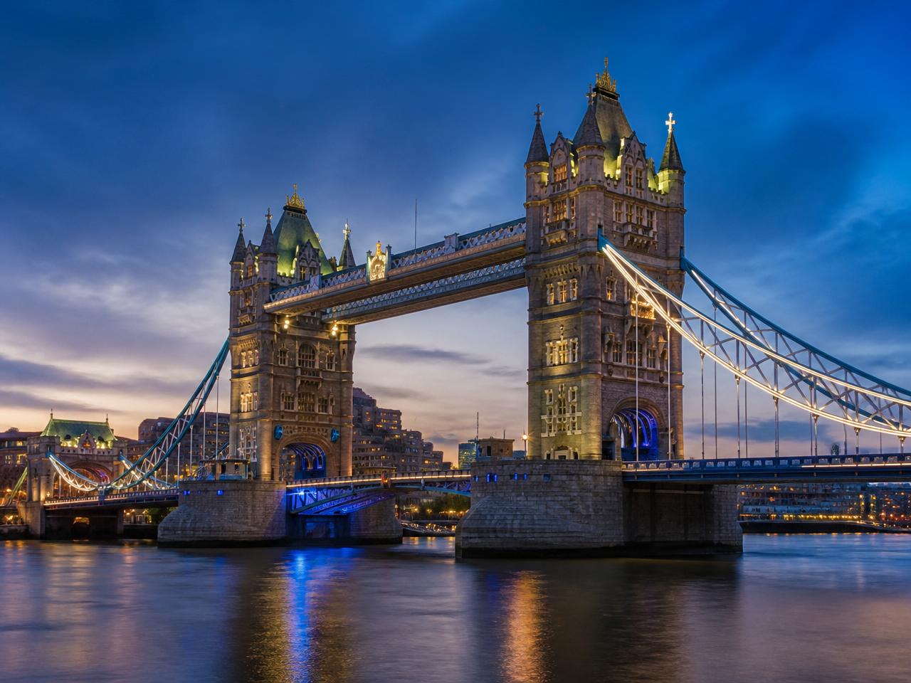 Tower Bridge in London illuminated at dusk